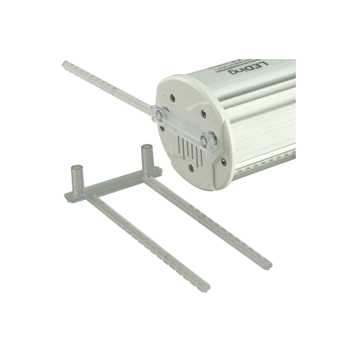 Biała cylindryczna lampa LED z aluminiową obudową, w której montowana jest przezroczysta plastikowa opaska mocująca.